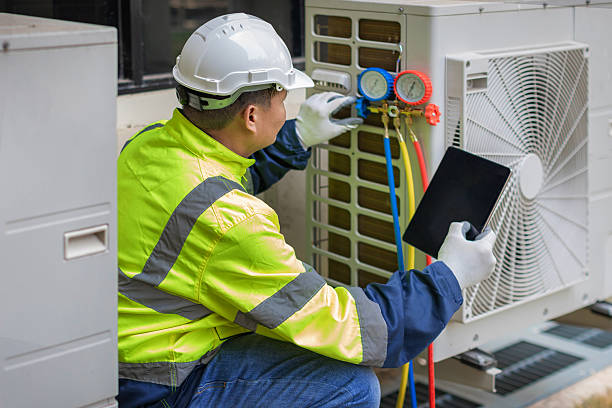 Professional Air Duct Cleaning technician working in Milford, IL